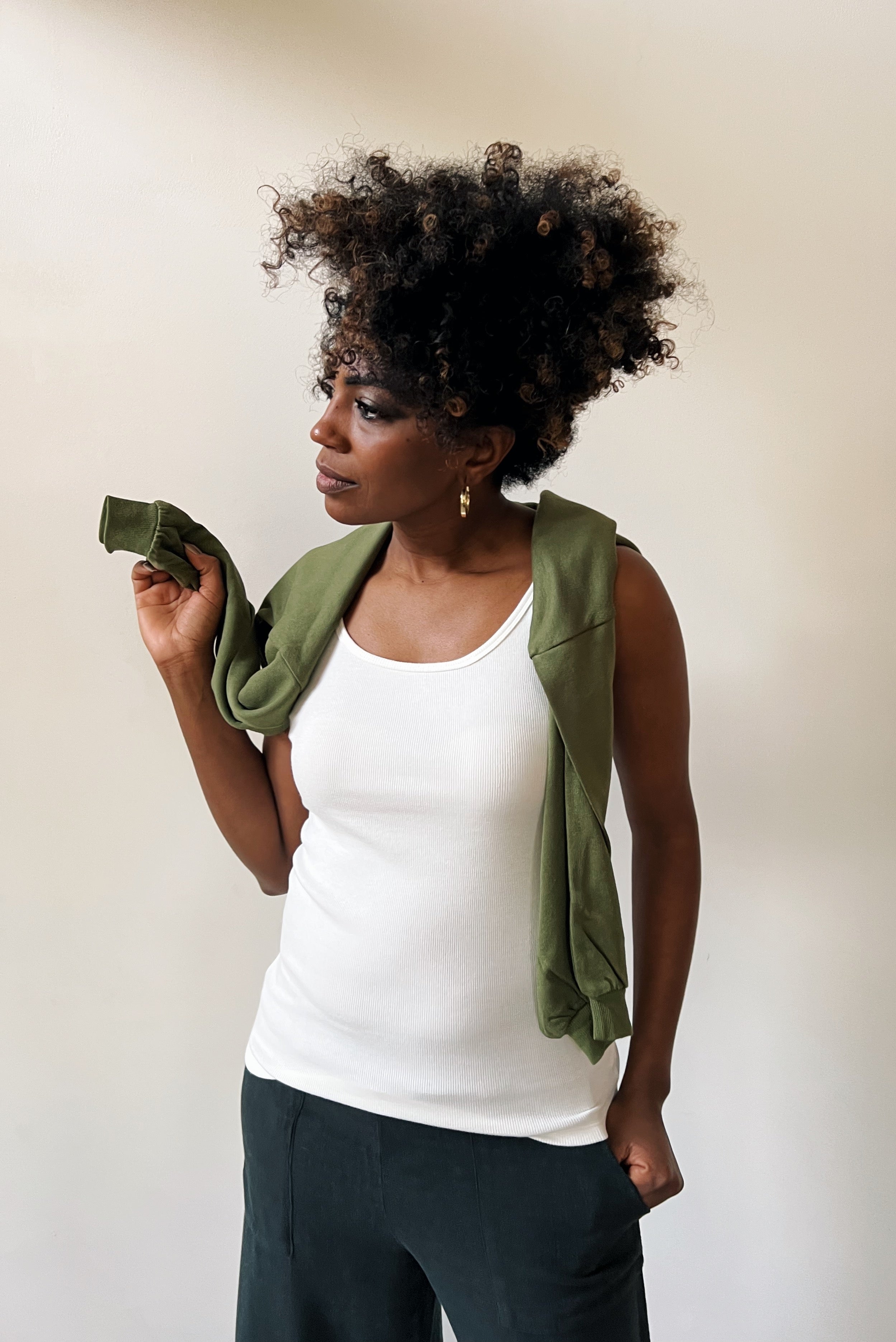 Tanktop in soft rib with open neck and fine shoulder straps.