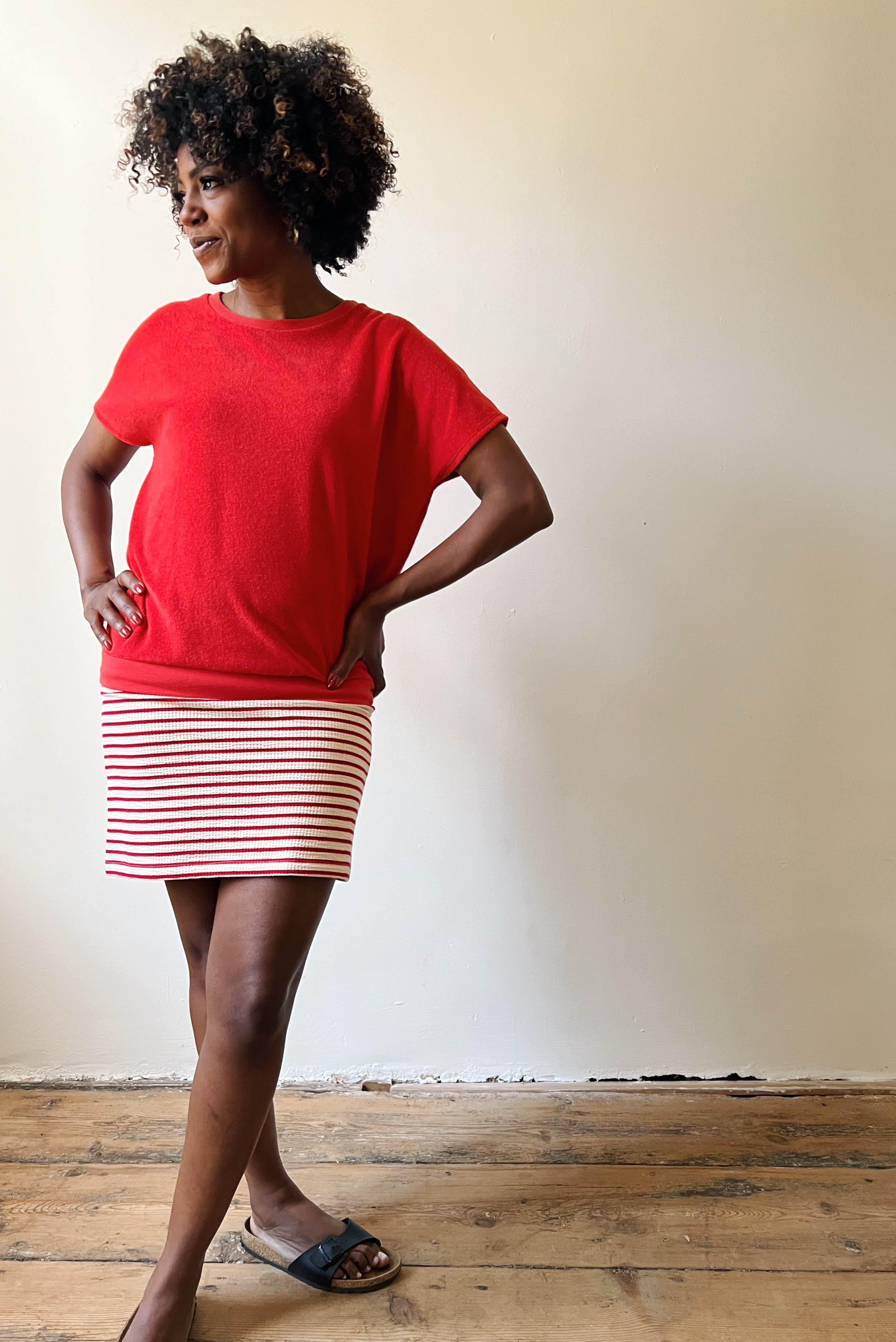 Straight, fitted jersey skirt that hits above the knee with an elastic waist.