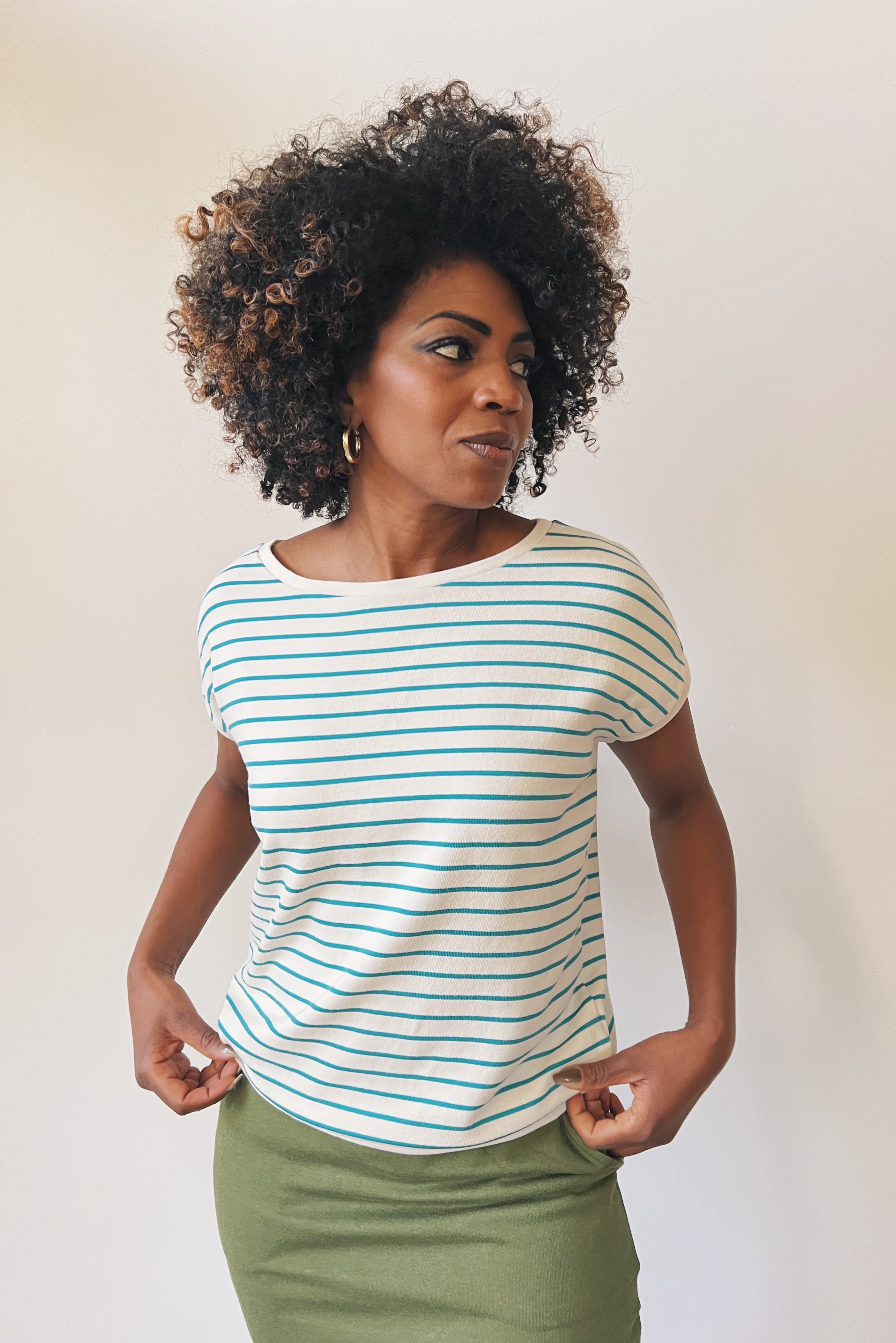 Loose top with round neck in refined knitted jersey with stripes. Finished of with a soft rib.