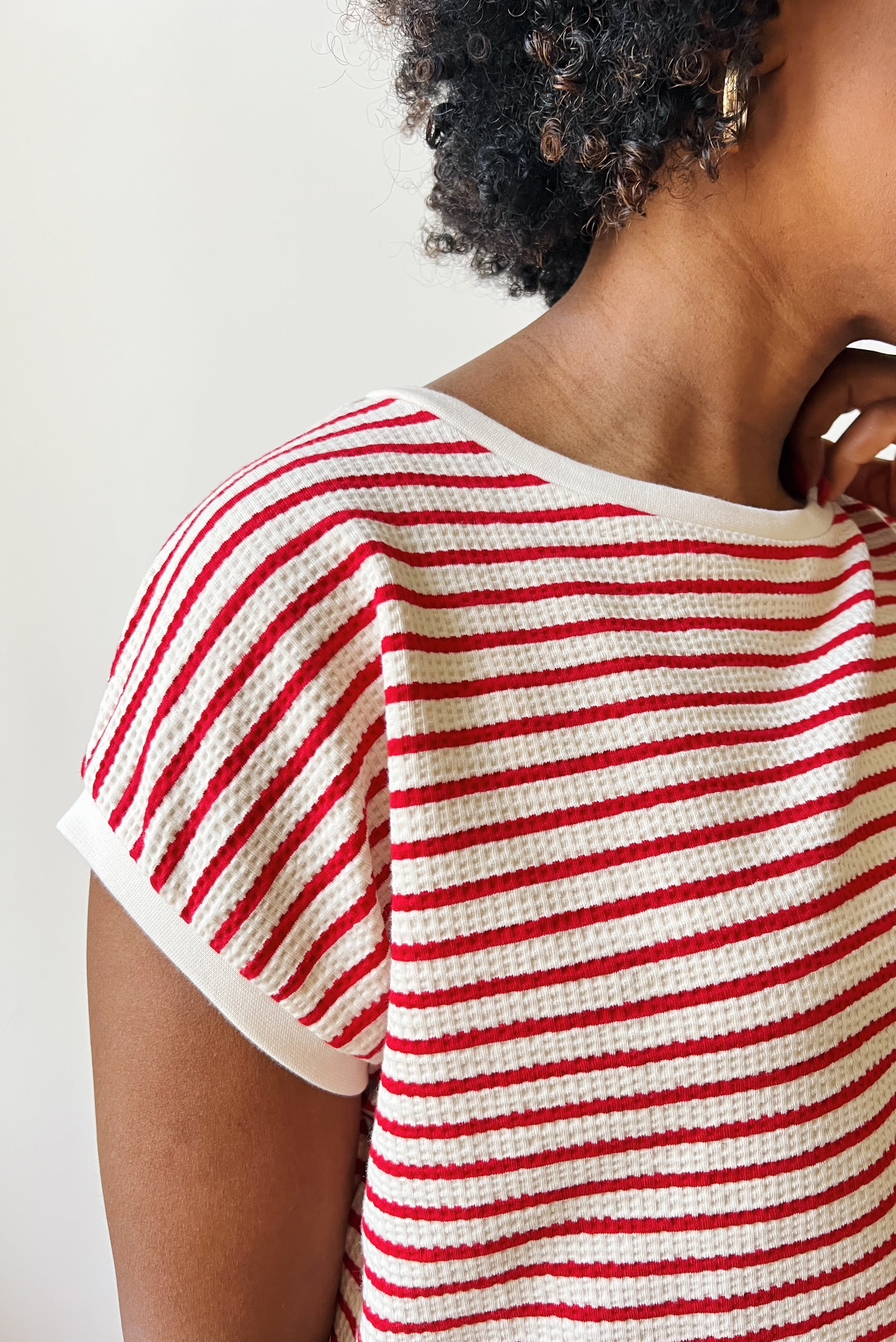 Loose top with round neck in refined knitted jersey with stripes. Finished of with a soft rib.