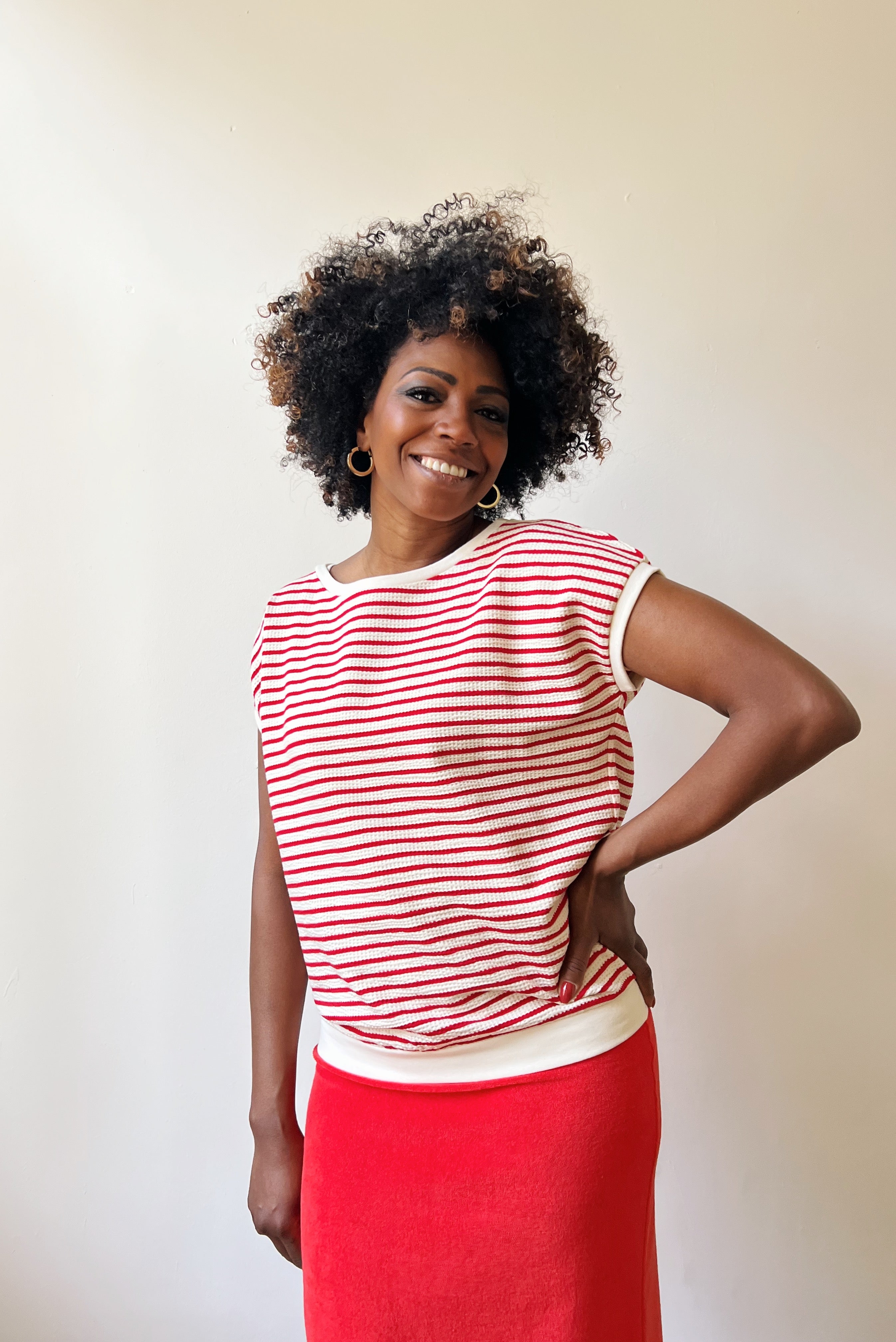 Loose top with round neck in refined knitted jersey with stripes. Finished of with a soft rib.